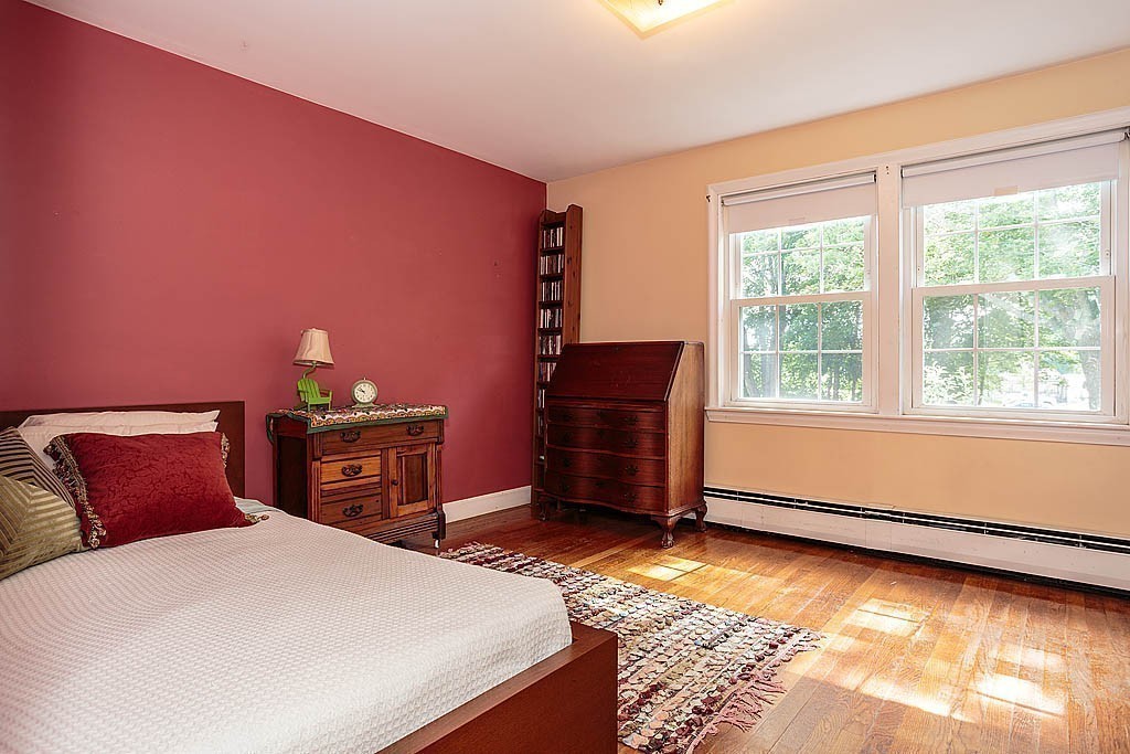 75 Taylor Road Belmont, MA 02478 - Photo 12 of 17 a bedroom with a bed and a window