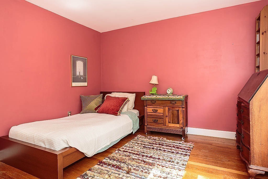 75 Taylor Road Belmont, MA 02478 - Photo 13 of 17 a bedroom with a bed and a night stand