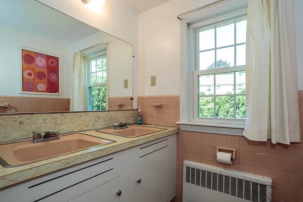 75 Taylor Road Belmont, MA 02478 - Photo 14 of 17 a bathroom with a sink and a window