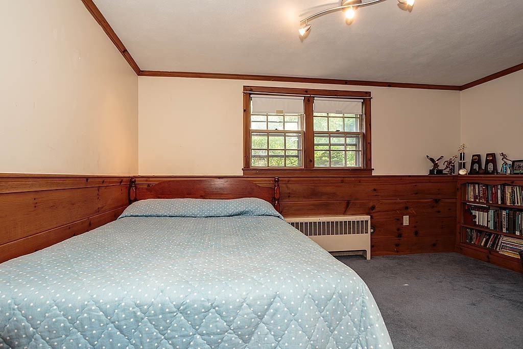 75 Taylor Road Belmont, MA 02478 - Photo 15 of 17 a bedroom with a bed and window