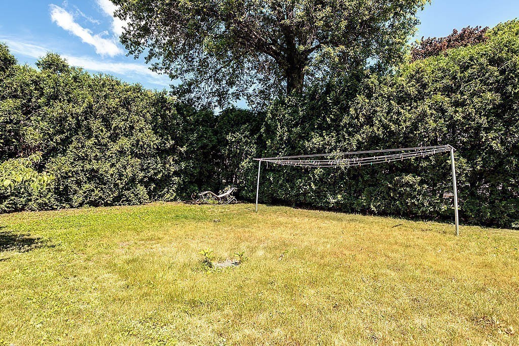75 Taylor Road Belmont, MA 02478 - Photo 17 of 17 a view of a pool with a yard