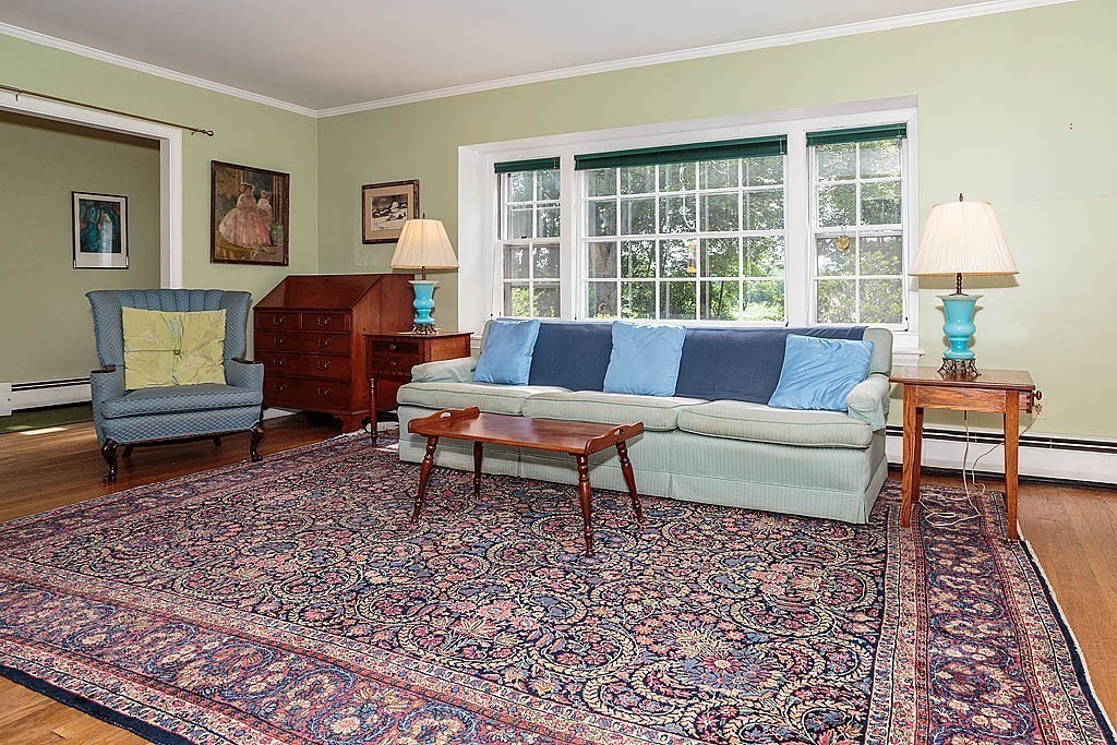 75 Taylor Road Belmont, MA 02478 - Photo 3 of 17 a living room with furniture and a window