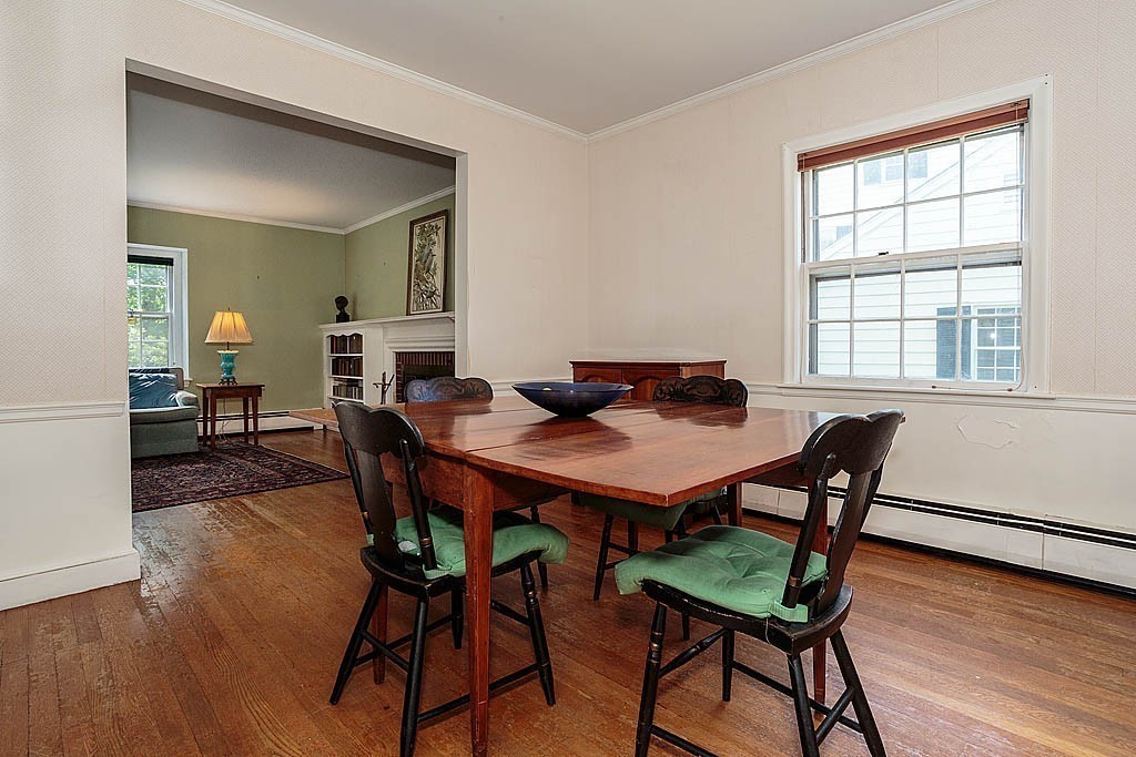 75 Taylor Road Belmont, MA 02478 - Photo 5 of 17 a view of a dining room with furniture and wooden floor