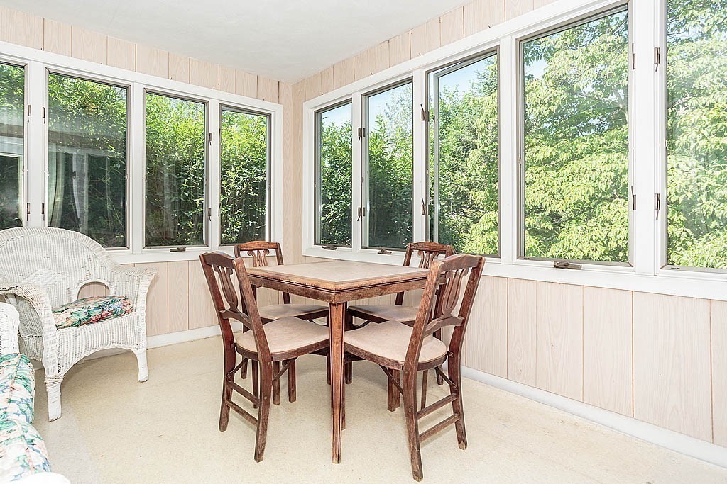 75 Taylor Road Belmont, MA 02478 - Photo 8 of 17 a view of a dining room with furniture window and outside view