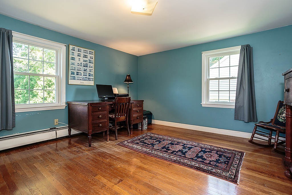 75 Taylor Road Belmont, MA 02478 - Photo 9 of 17 a workspace with furniture and a window