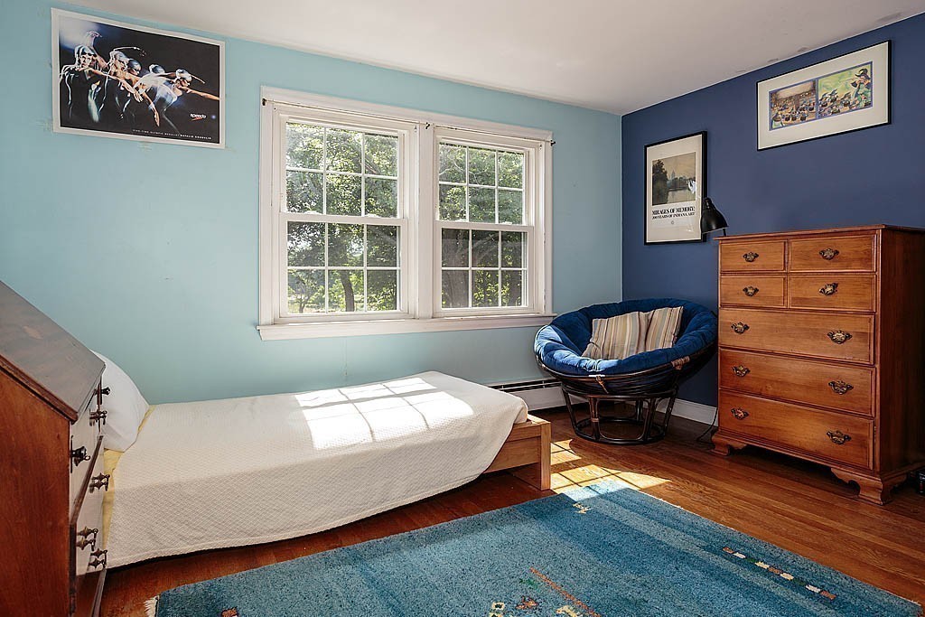 75 Taylor Road Belmont, MA 02478 - Photo 10 of 17 a bedroom with a bed and wooden floor