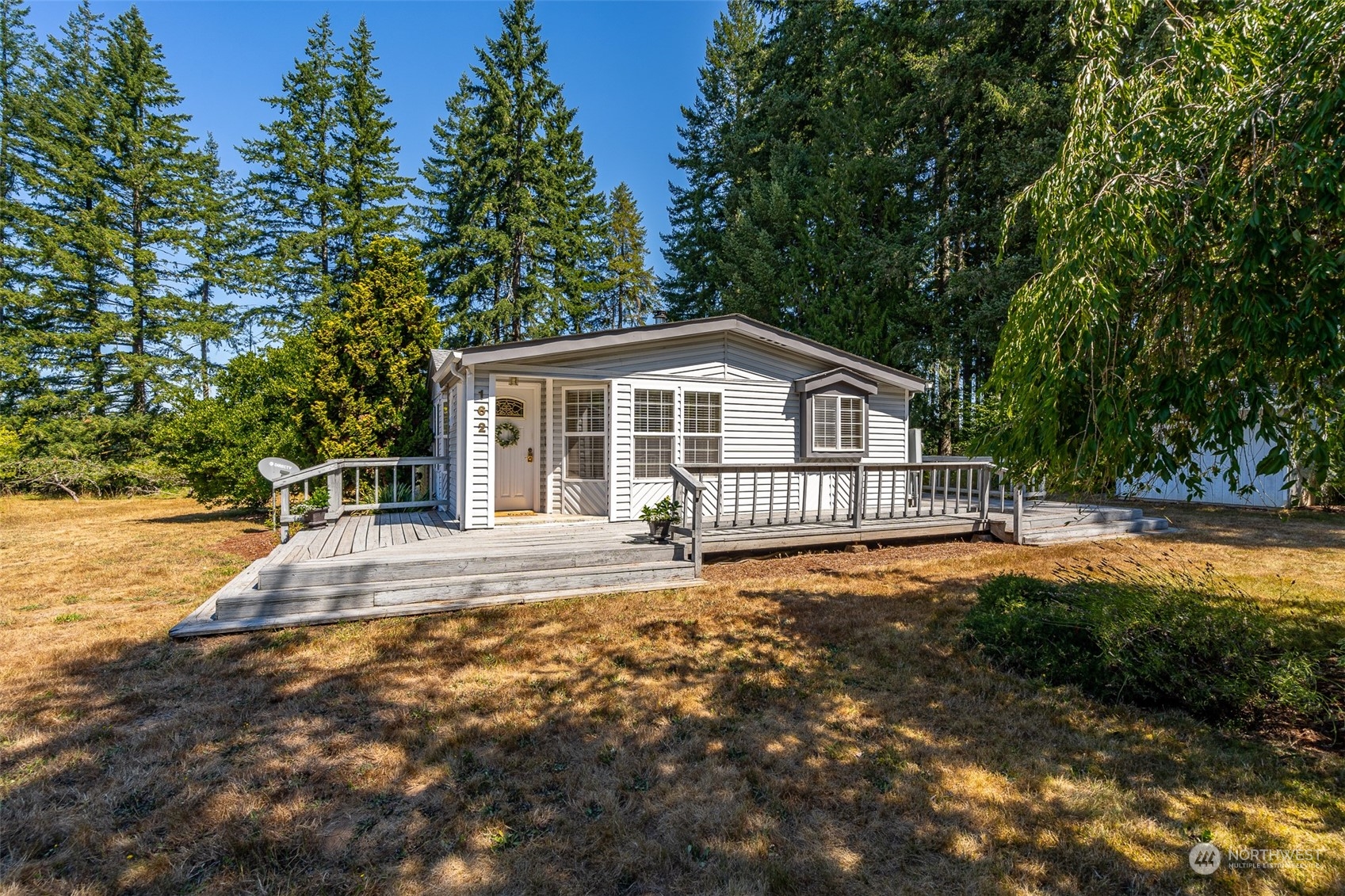 162 Mountain Sun Road Chehalis, WA 98532 - Photo 3 of 39 a view of a house with a yard