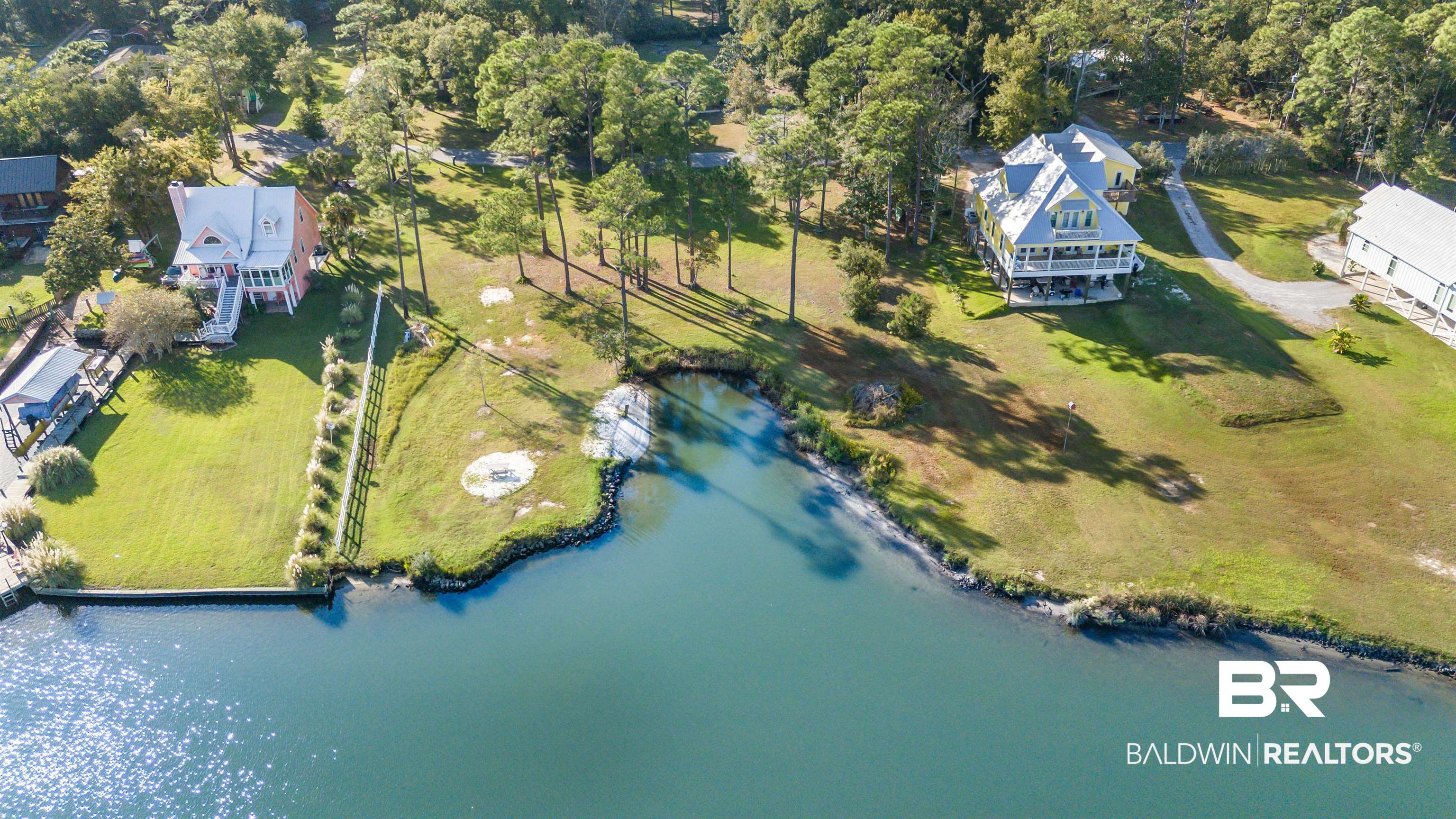 6921 Piney Woods Road Foley, AL 36535 - Photo 36 of 44 Drone / aerial view with a water view