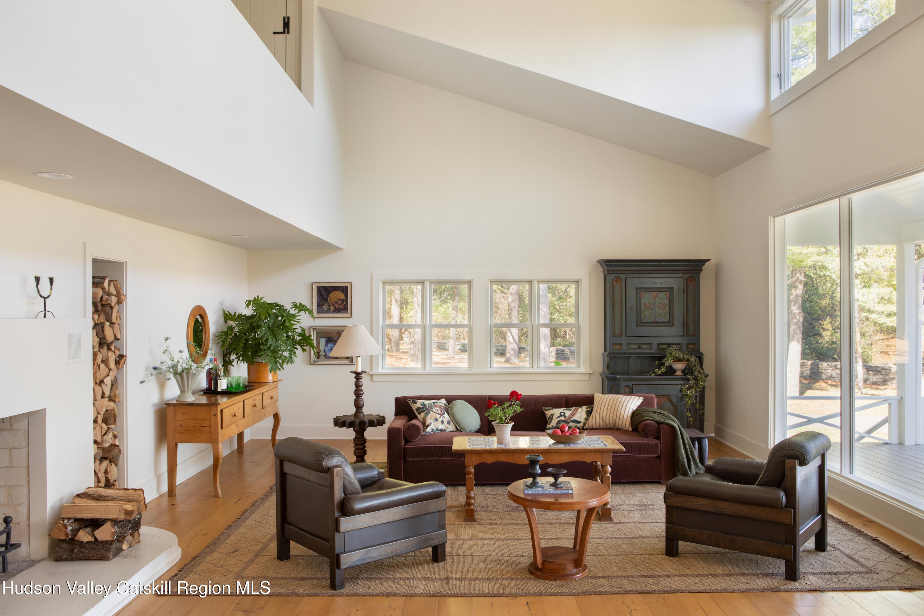 353 Haas Hill Road Climax, NY 12042 - Photo 13 of 50 a living room with furniture or couch and a potted plant