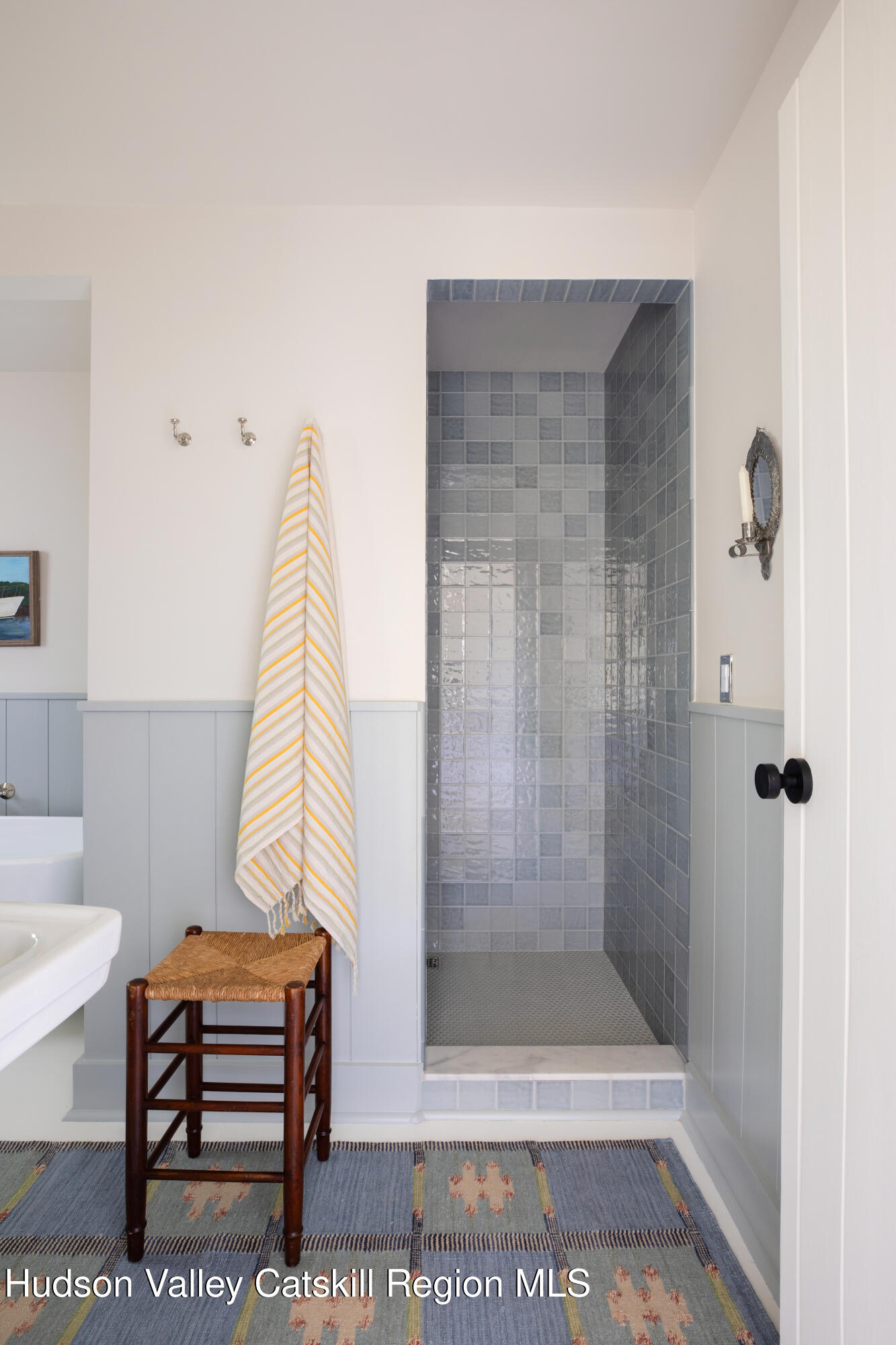 353 Haas Hill Road Climax, NY 12042 - Photo 22 of 50 a bathroom with a sink a mirror and a shower