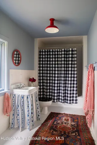 a view of a yard with large trees