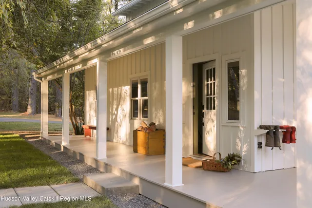 a view of a lobby with furniture and floor to ceiling window