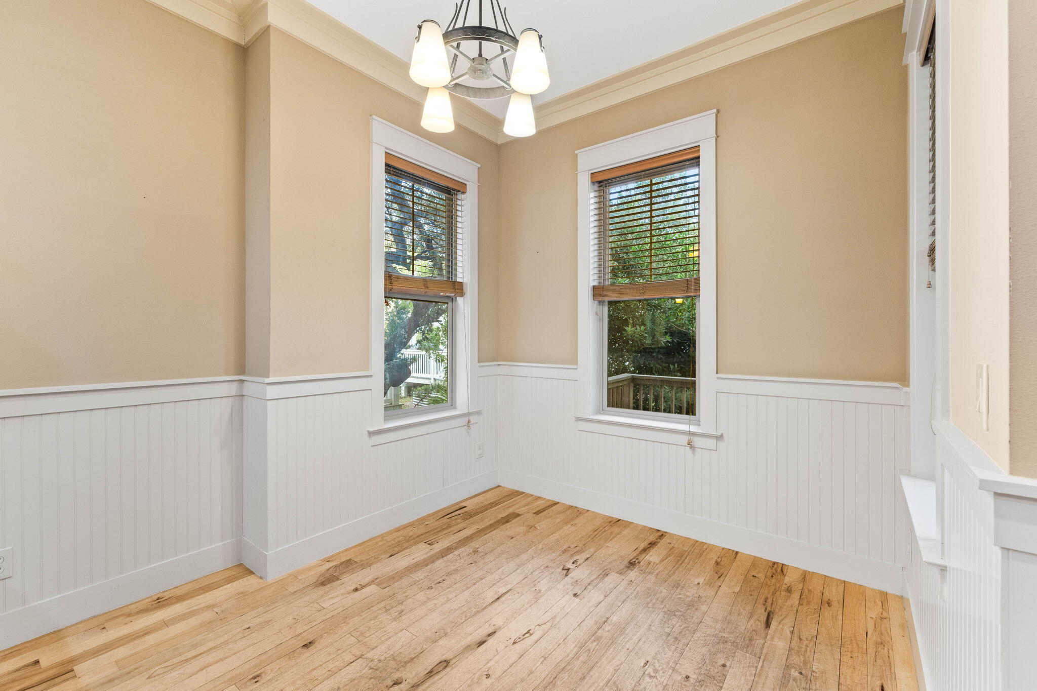 8 Gulf Mark Lane Santa Rosa Beach, FL 32459 - Photo 15 of 44 a view of an empty room with wooden floor and a window