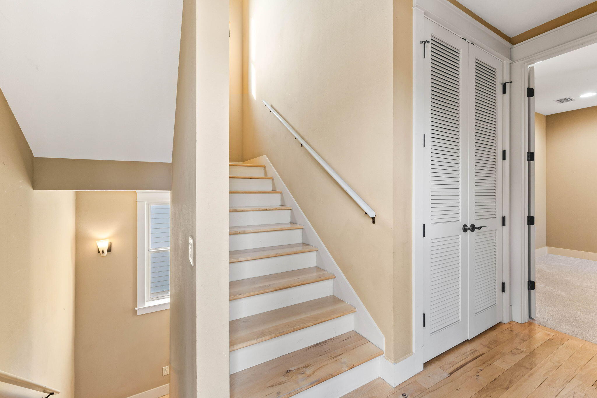 8 Gulf Mark Lane Santa Rosa Beach, FL 32459 - Photo 32 of 44 a view of a hallway with wooden floor and entryway