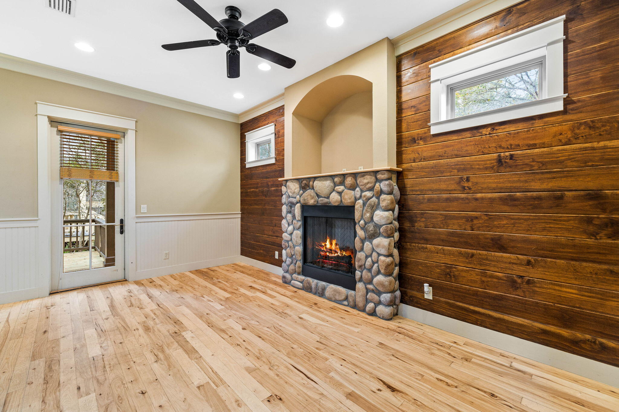 8 Gulf Mark Lane Santa Rosa Beach, FL 32459 - Photo 4 of 44 a bedroom with a bed and a fireplace