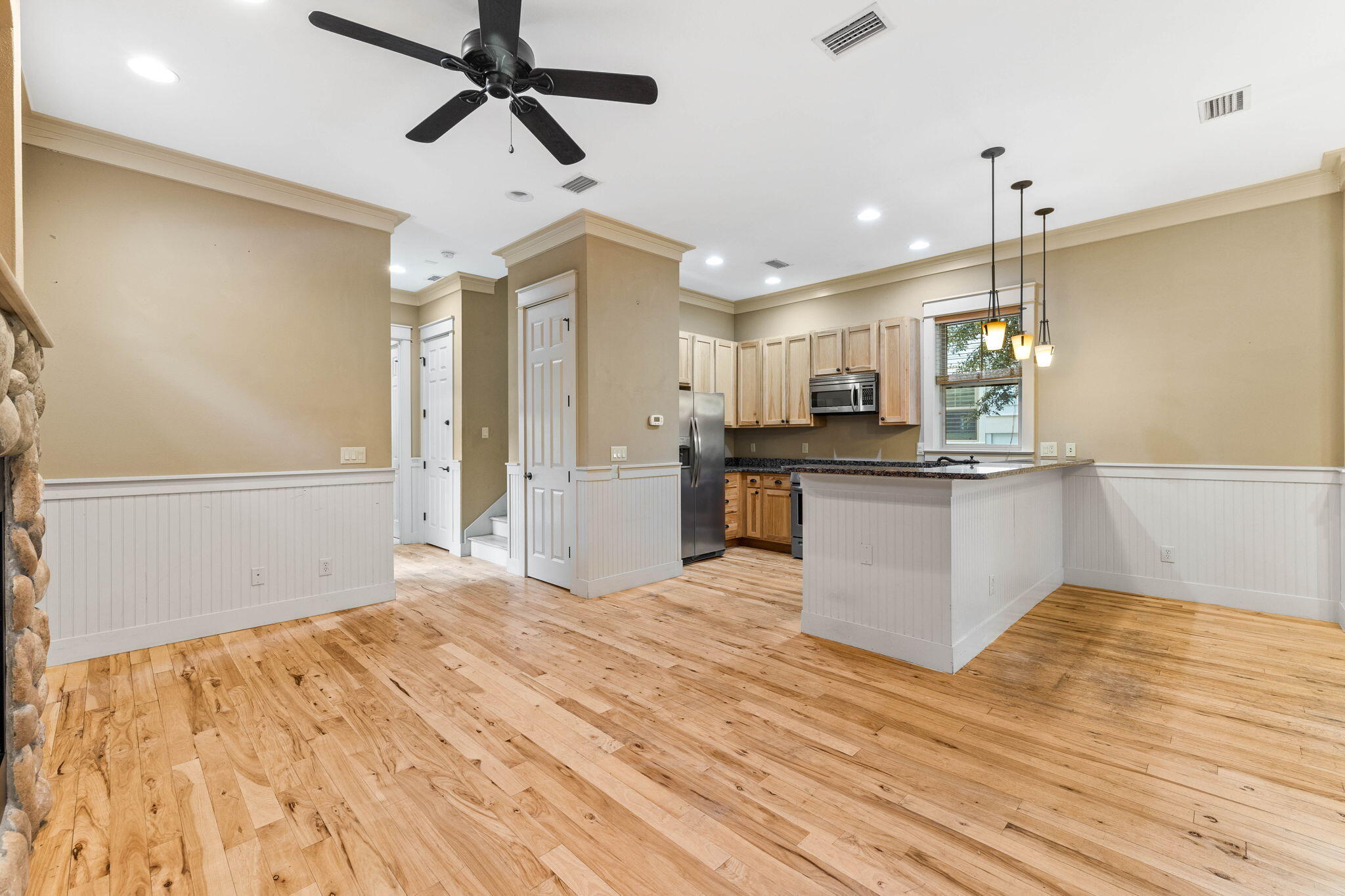 8 Gulf Mark Lane Santa Rosa Beach, FL 32459 - Photo 9 of 44 a view of a kitchen with wooden floor and a sink