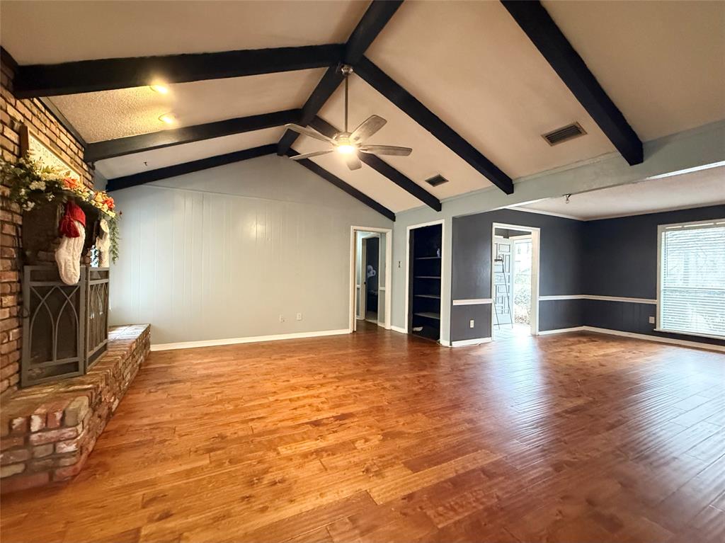 2104 Greenbriar Drive Ruston, LA 71270 - Photo 8 of 35 a view of an empty room with wooden floor and a window