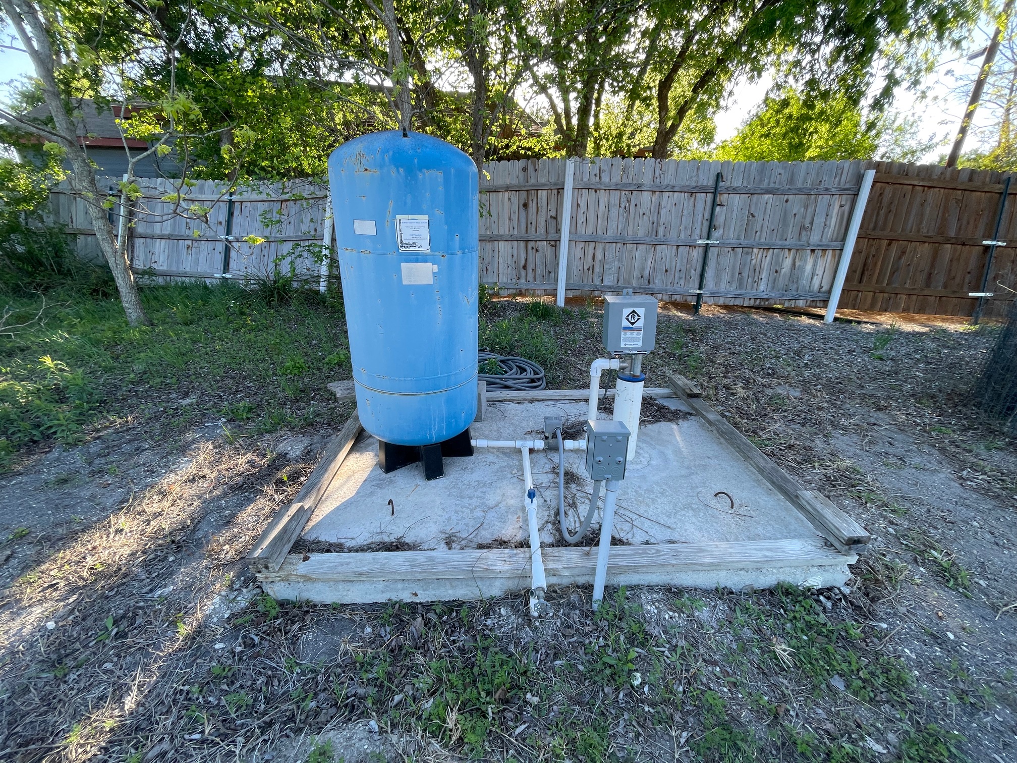 271 Ridgeline Road Leander, TX 78641 - Photo 6 of 20 a view of a backyard with plants and wooden fence
