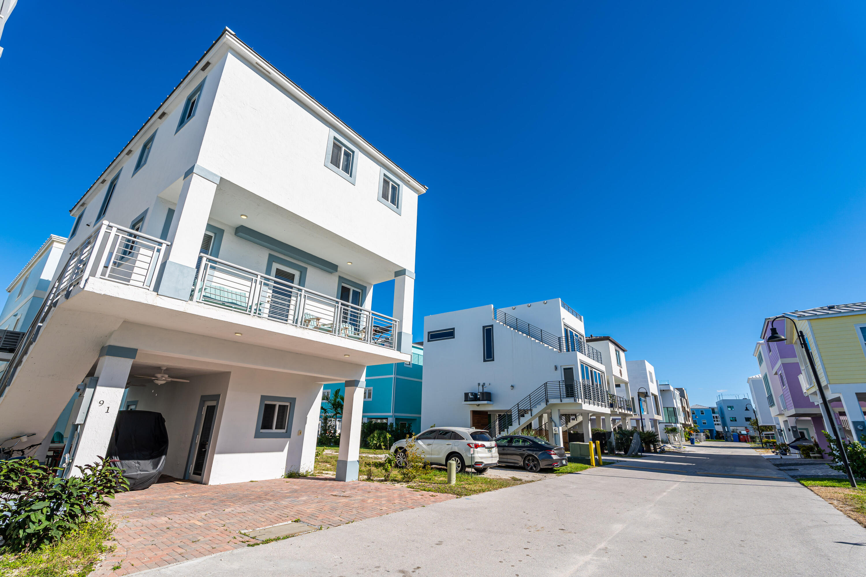94825 Overseas Highway, Unit 91 Key Largo, FL 33037 - Photo 14 of 49 a view of a street with cars