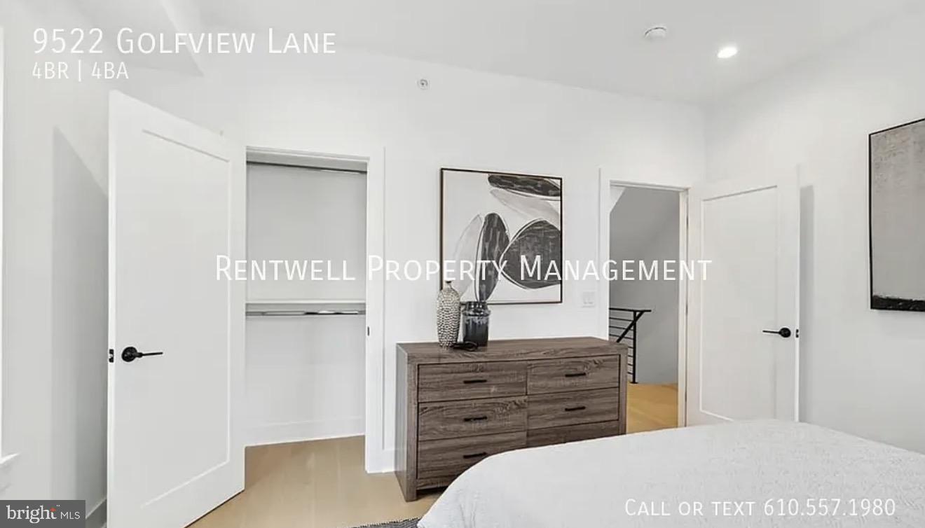 9522 Golfview Lane Philadelphia, PA 19114 - Photo 21 of 26 a bedroom with a bed and a dresser