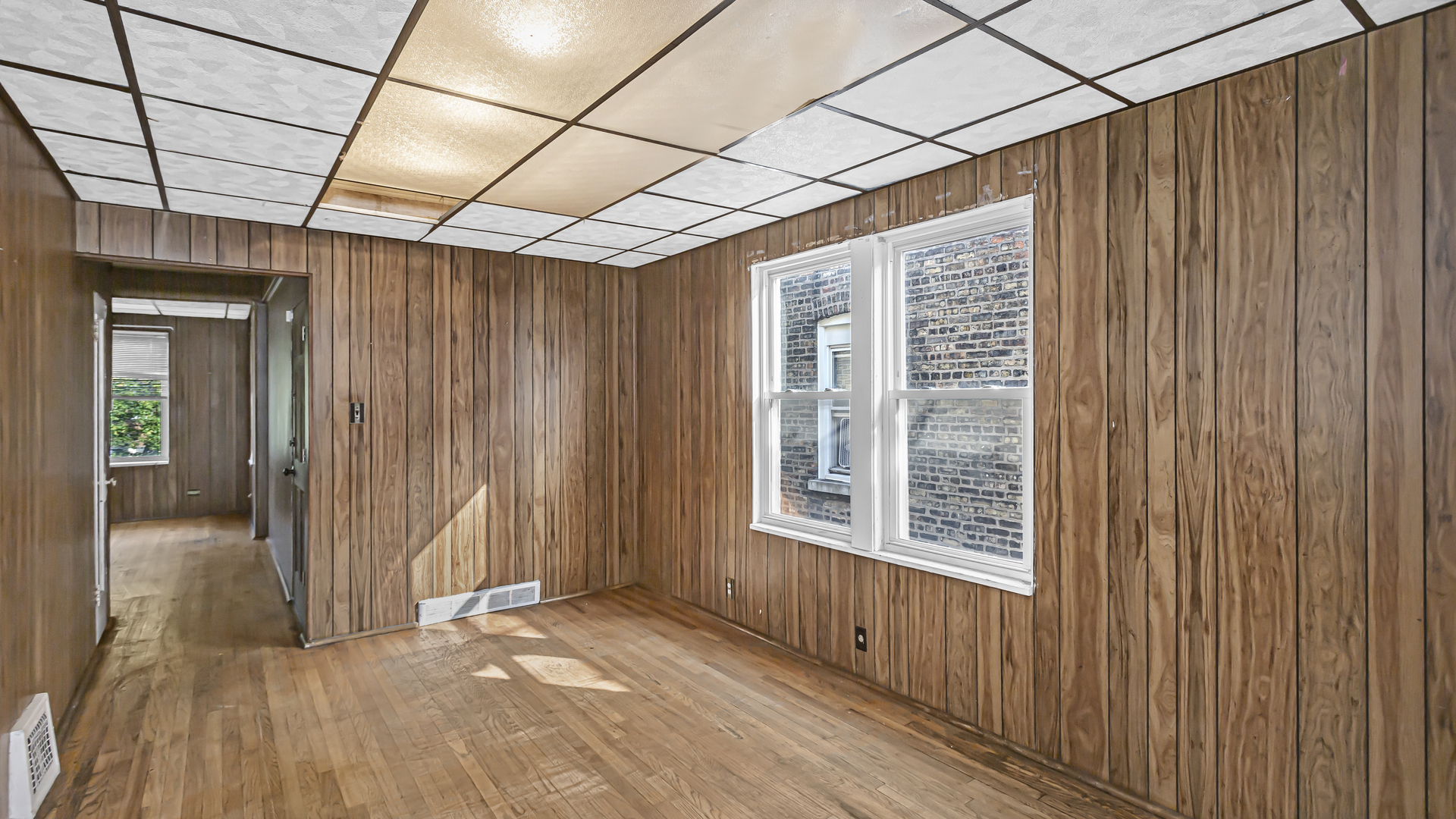 1712 North Monitor Avenue Chicago, IL 60639 - Photo 16 of 33 a view of an empty room with a window