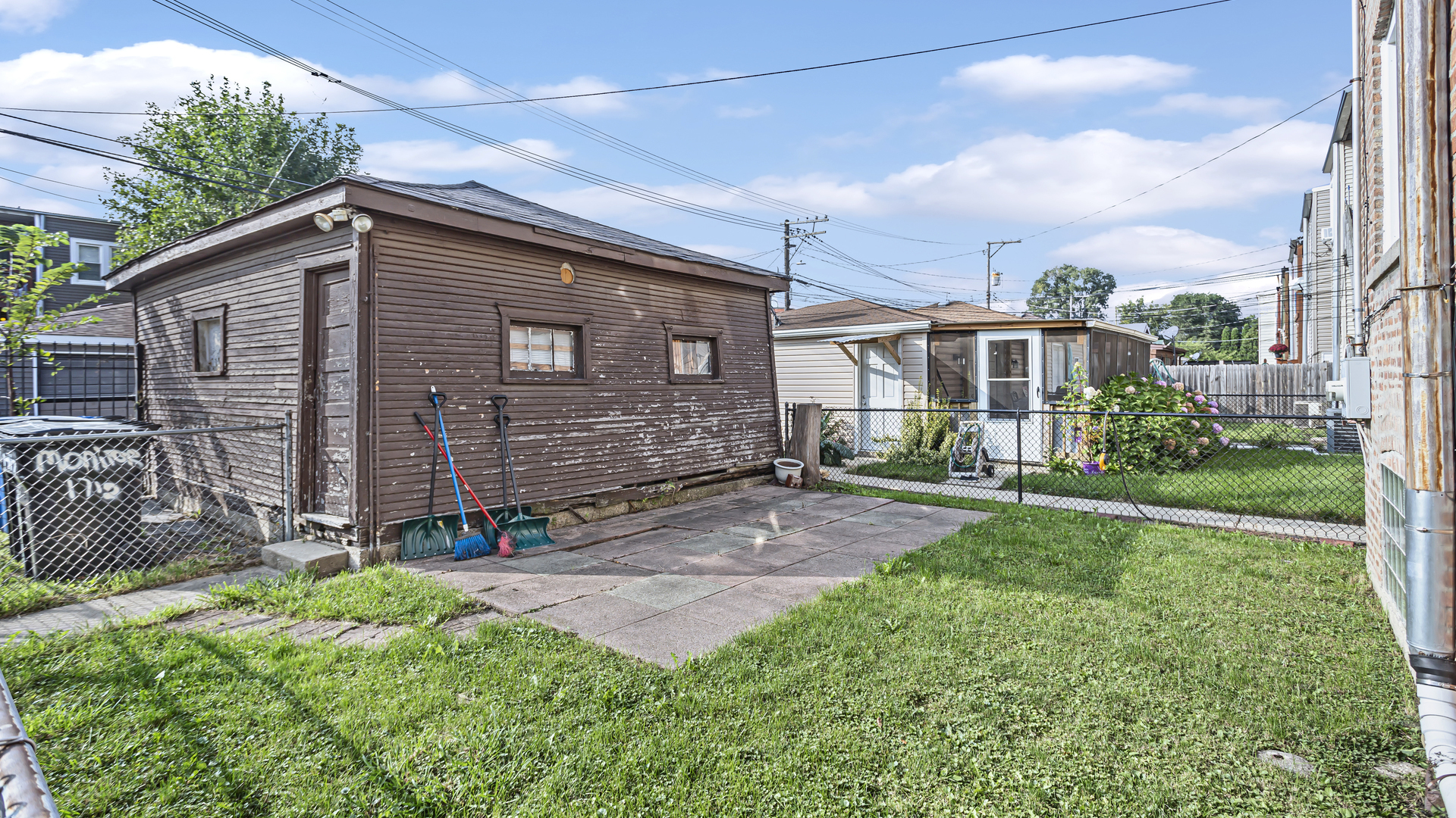 1712 North Monitor Avenue Chicago, IL 60639 - Photo 28 of 33 a view of backyard with a garden and plants