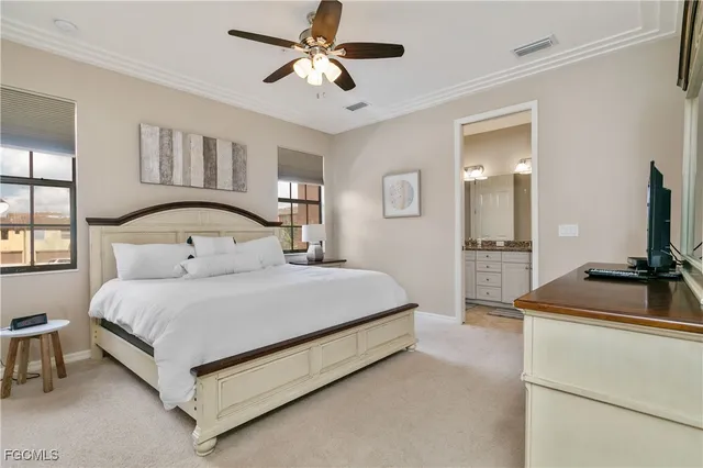 a bathroom with a granite countertop sink a large mirror and a shower