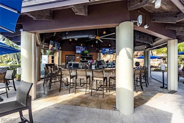 a room with gym equipment and a large window