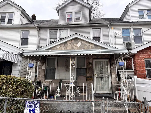 a front view of a house with balcony