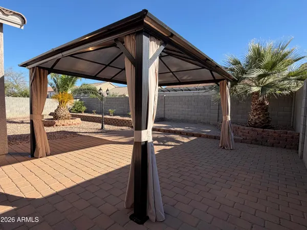 a view of a backyard of the house