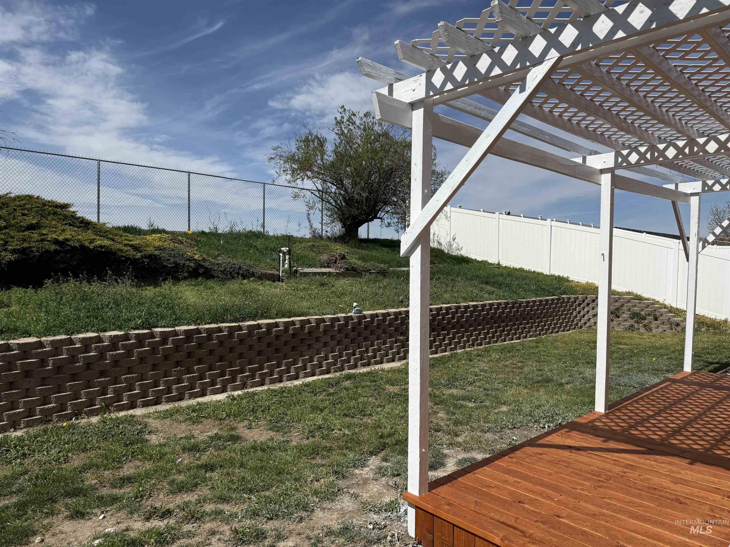 523 Morning Dove Way Marsing, ID 83639 - Photo 4 of 23 Fenced backyard featuring a pergola