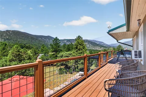 a view of balcony with furniture