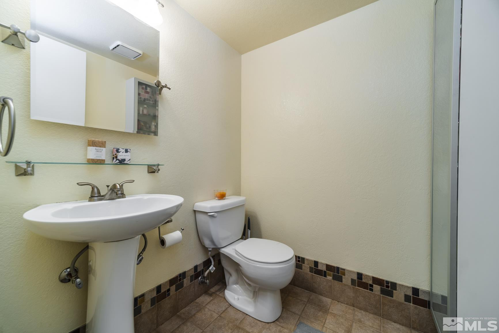 2510 Keystone Avenue Reno, NV 89503 - Photo 11 of 33 a bathroom with a sink toilet and a mirror