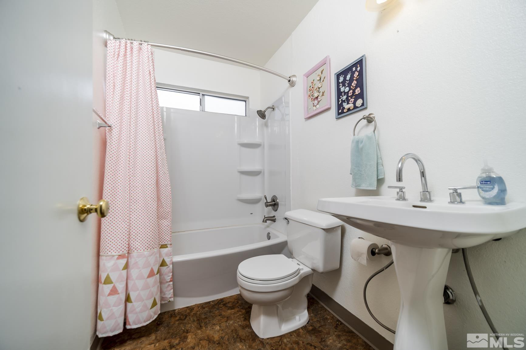 2510 Keystone Avenue Reno, NV 89503 - Photo 17 of 33 a bathroom with a toilet a sink and a bathtub