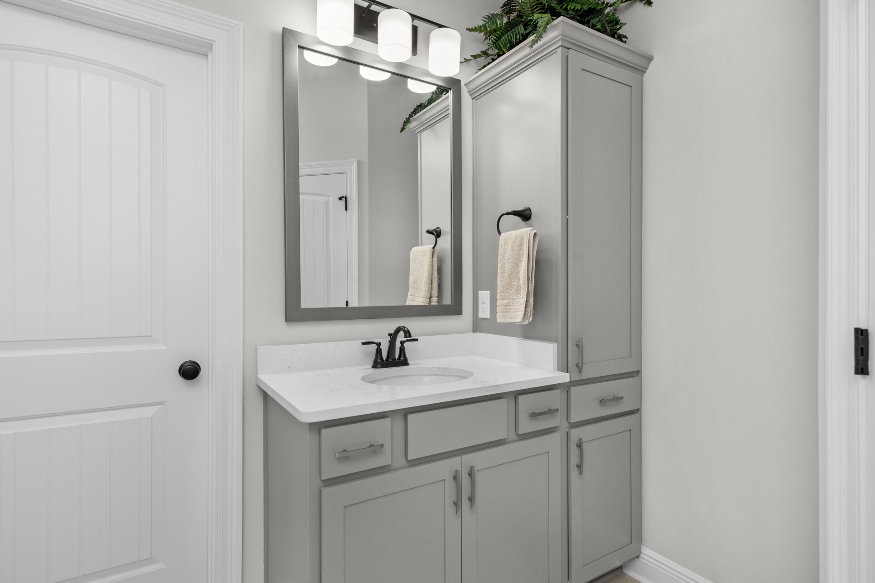 63 Alley Oak Lane Freeport, FL 32439 - Photo 12 of 50 a bathroom with a sink and a mirror