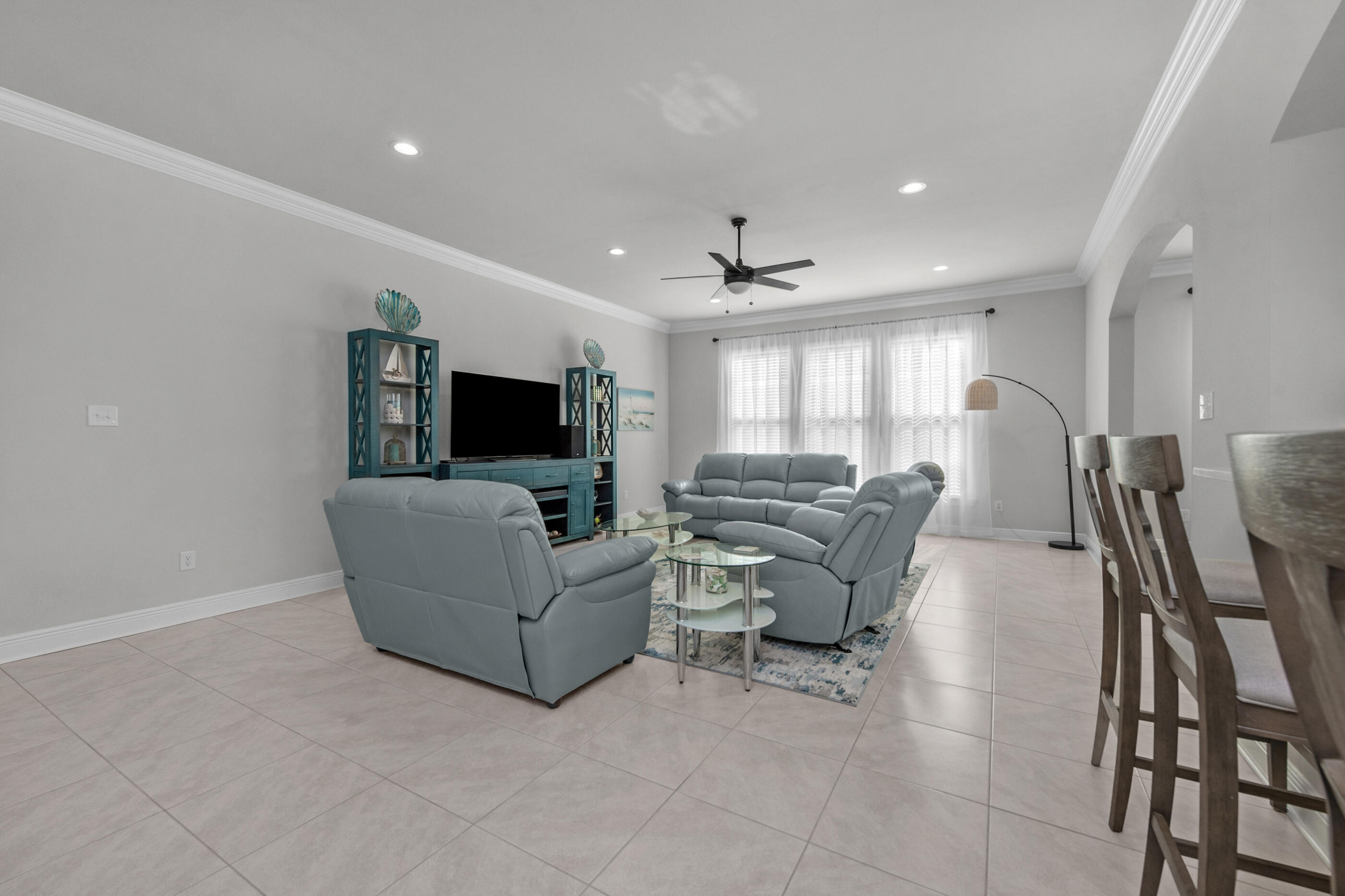63 Alley Oak Lane Freeport, FL 32439 - Photo 21 of 50 a living room with furniture and a flat screen tv