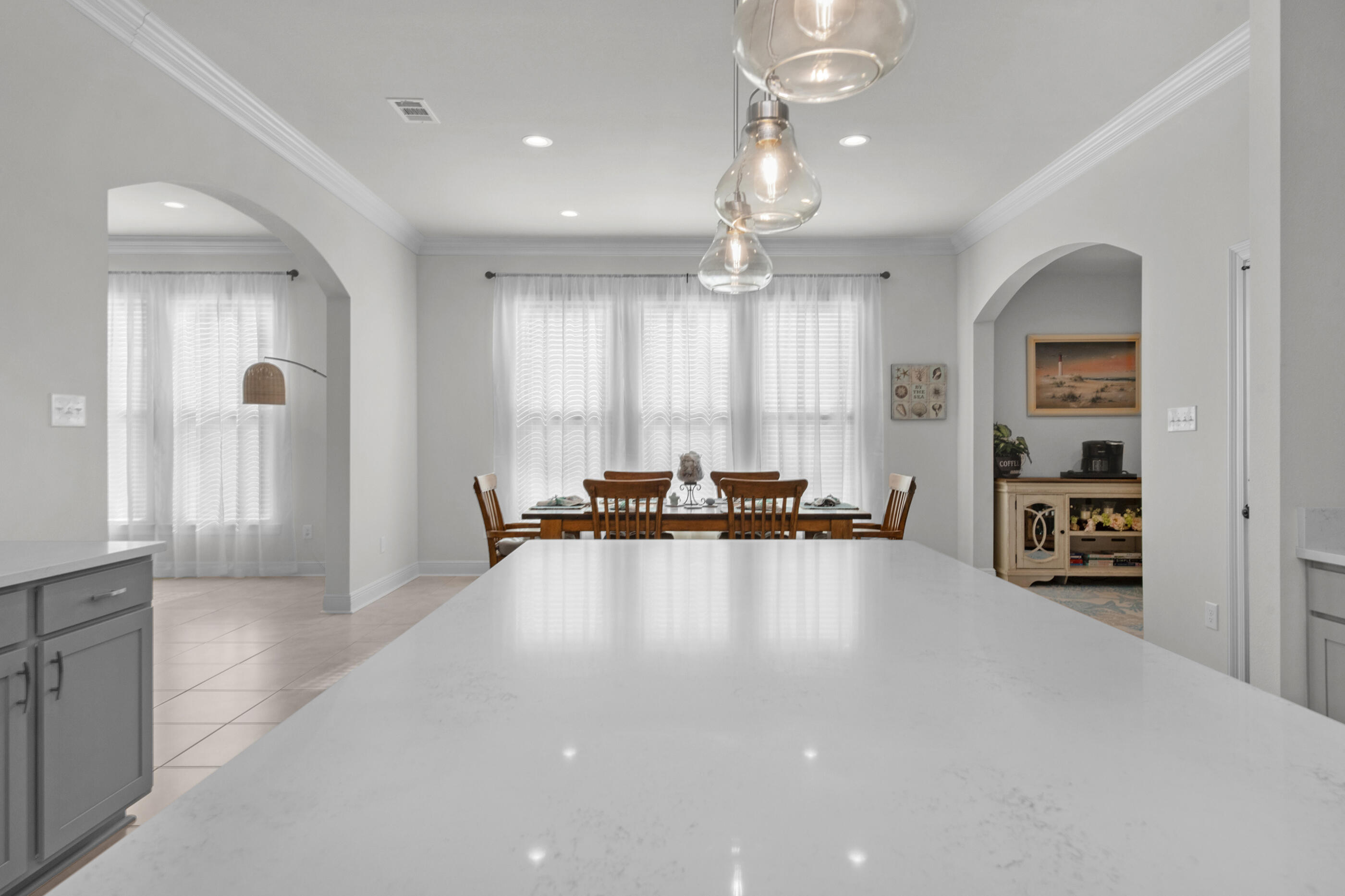 63 Alley Oak Lane Freeport, FL 32439 - Photo 32 of 50 a large hall with a large window and chandelier