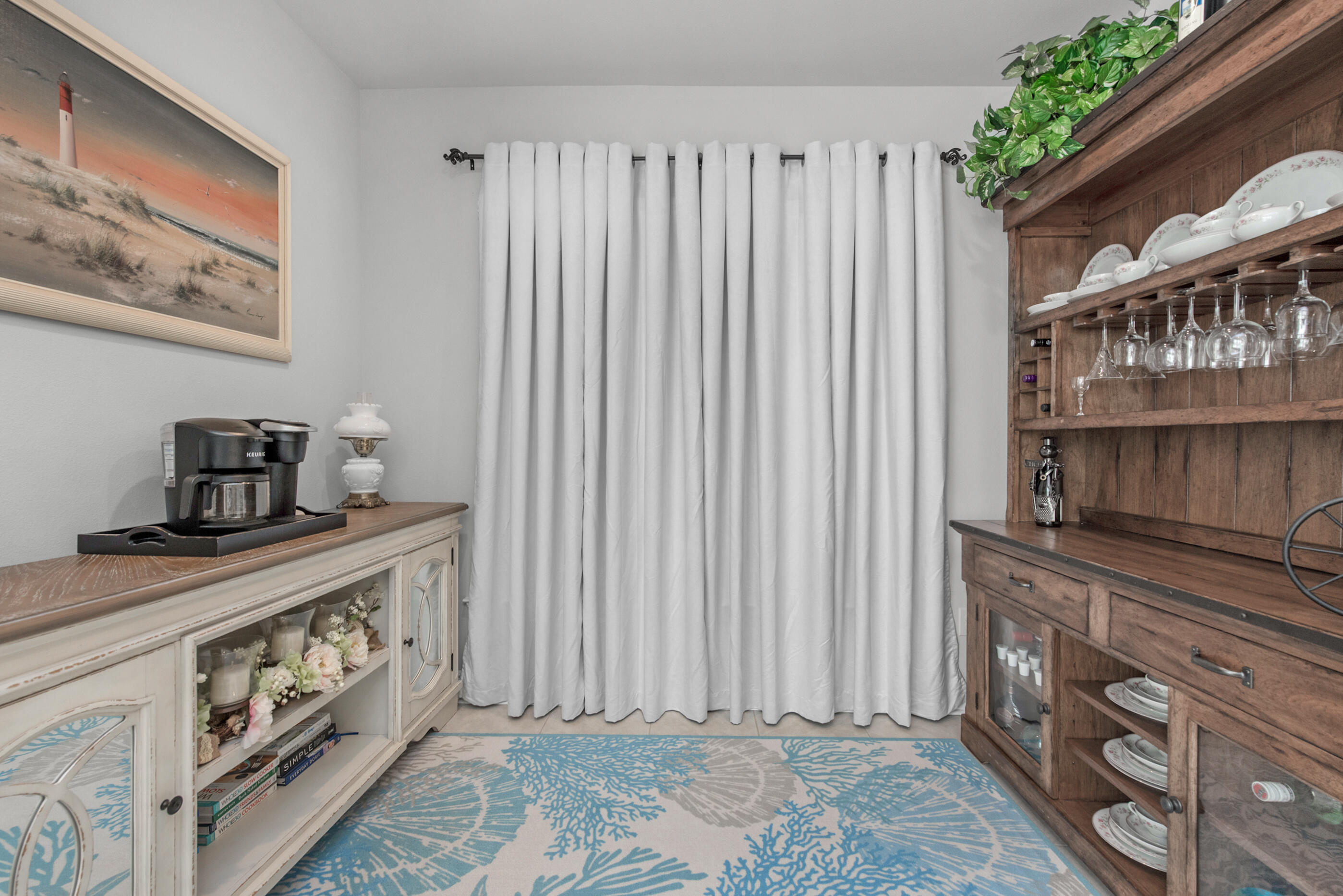 63 Alley Oak Lane Freeport, FL 32439 - Photo 36 of 50 a kitchen with stainless steel appliances a stove and white cabinets