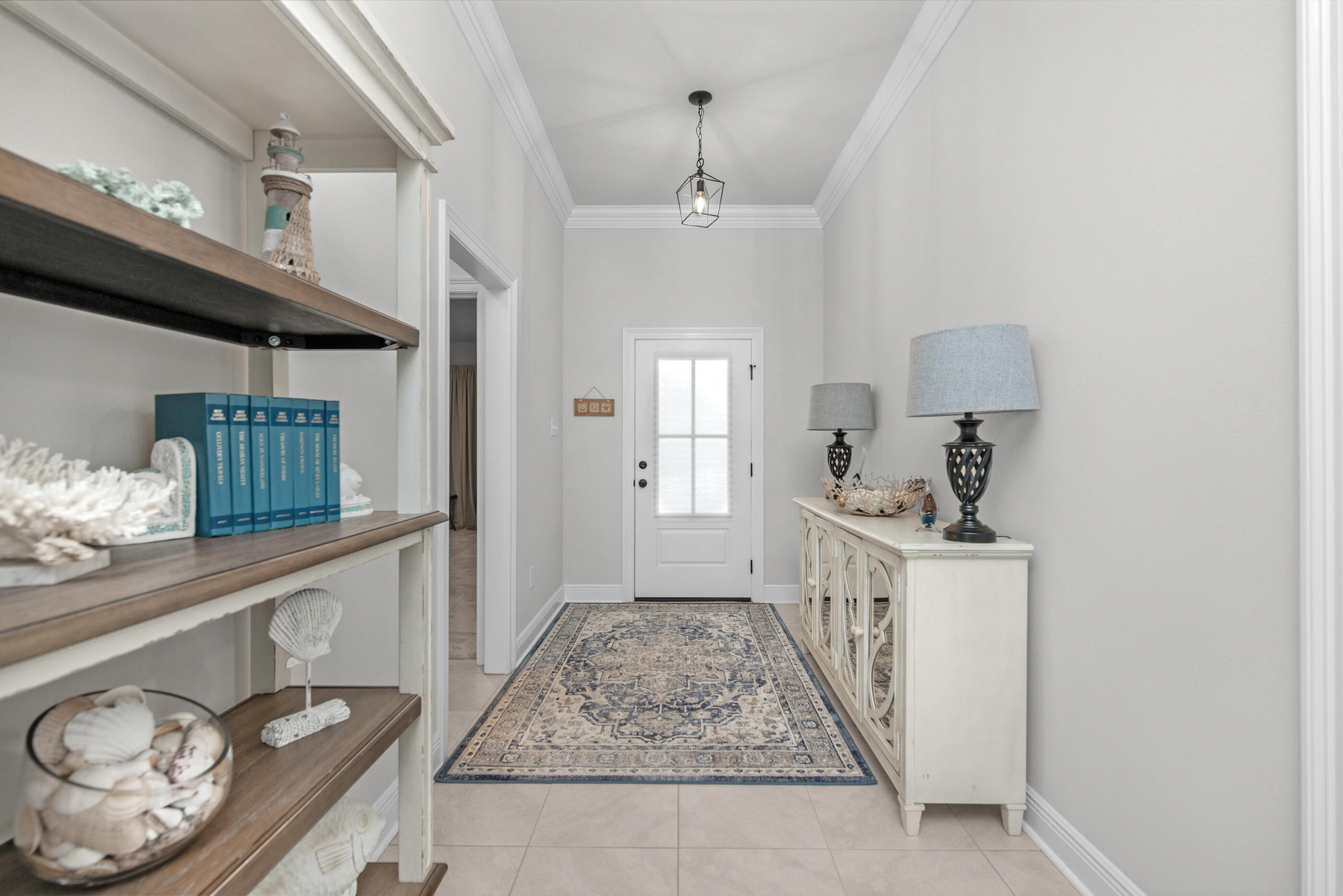 63 Alley Oak Lane Freeport, FL 32439 - Photo 5 of 50 a kitchen with stainless steel appliances granite countertop a sink stove and cabinets