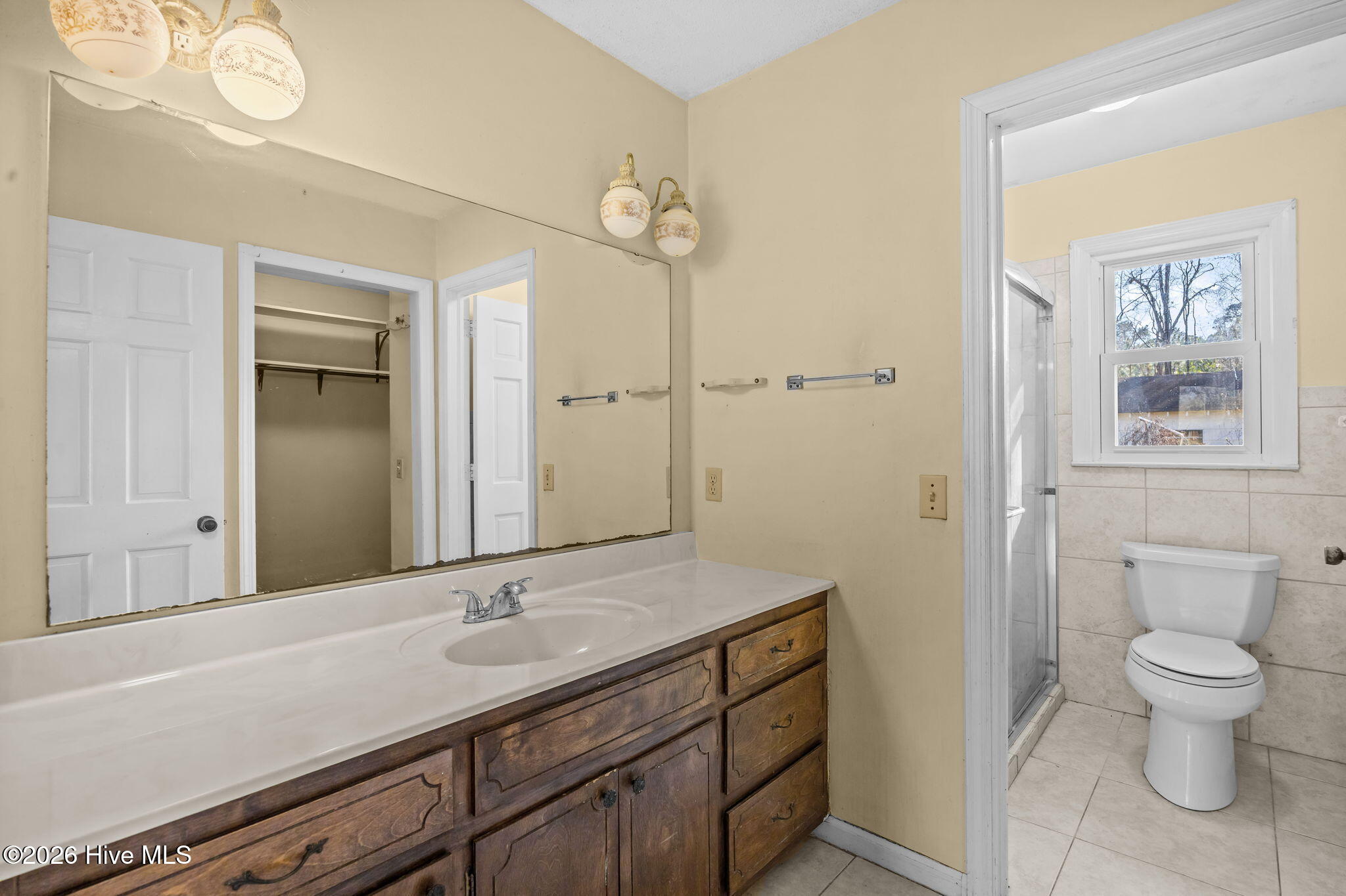 775 Governors Road Southeast Winnabow, NC 28479 - Photo 38 of 43 Primary bath w/ walk-in shower & water closet