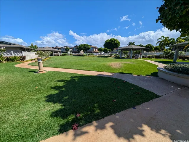 a view of a golf course with a house