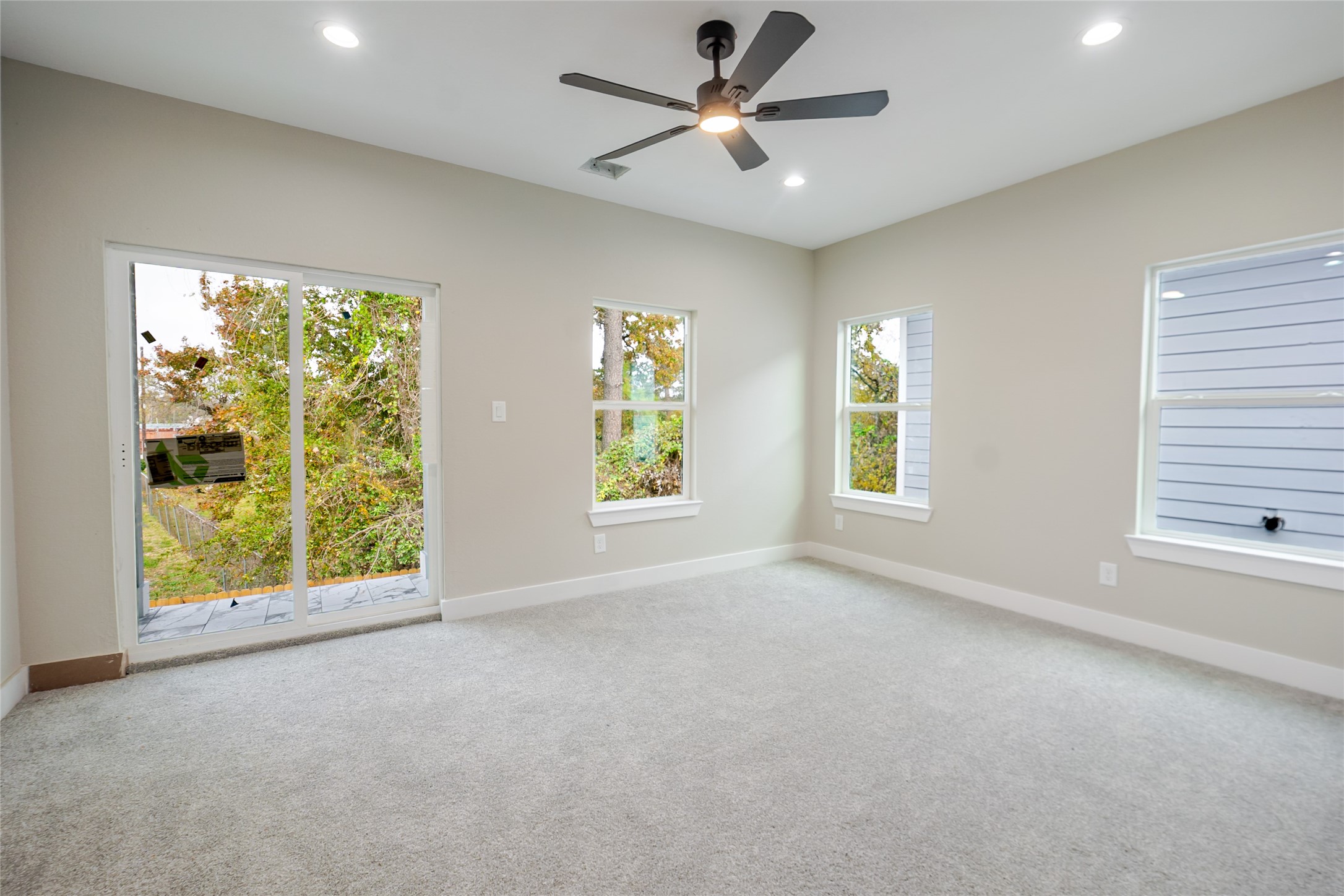 8709 Westcott Road, Unit A AND B Houston, TX 77016 - Photo 13 of 14 a view of an empty room with a window and a kitchen