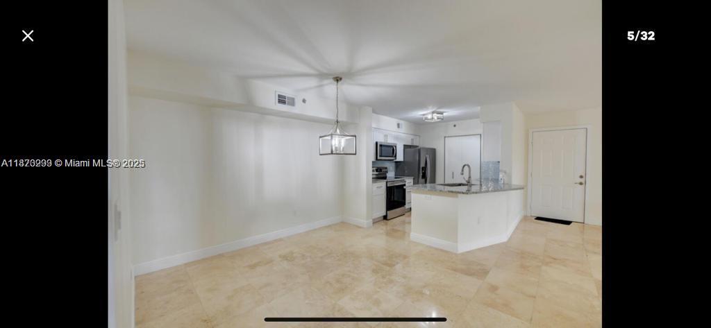3259 Clint Moore Road, Unit 103 Boca Raton, FL 33496 - Photo 4 of 40 a view of a kitchen and a sink
