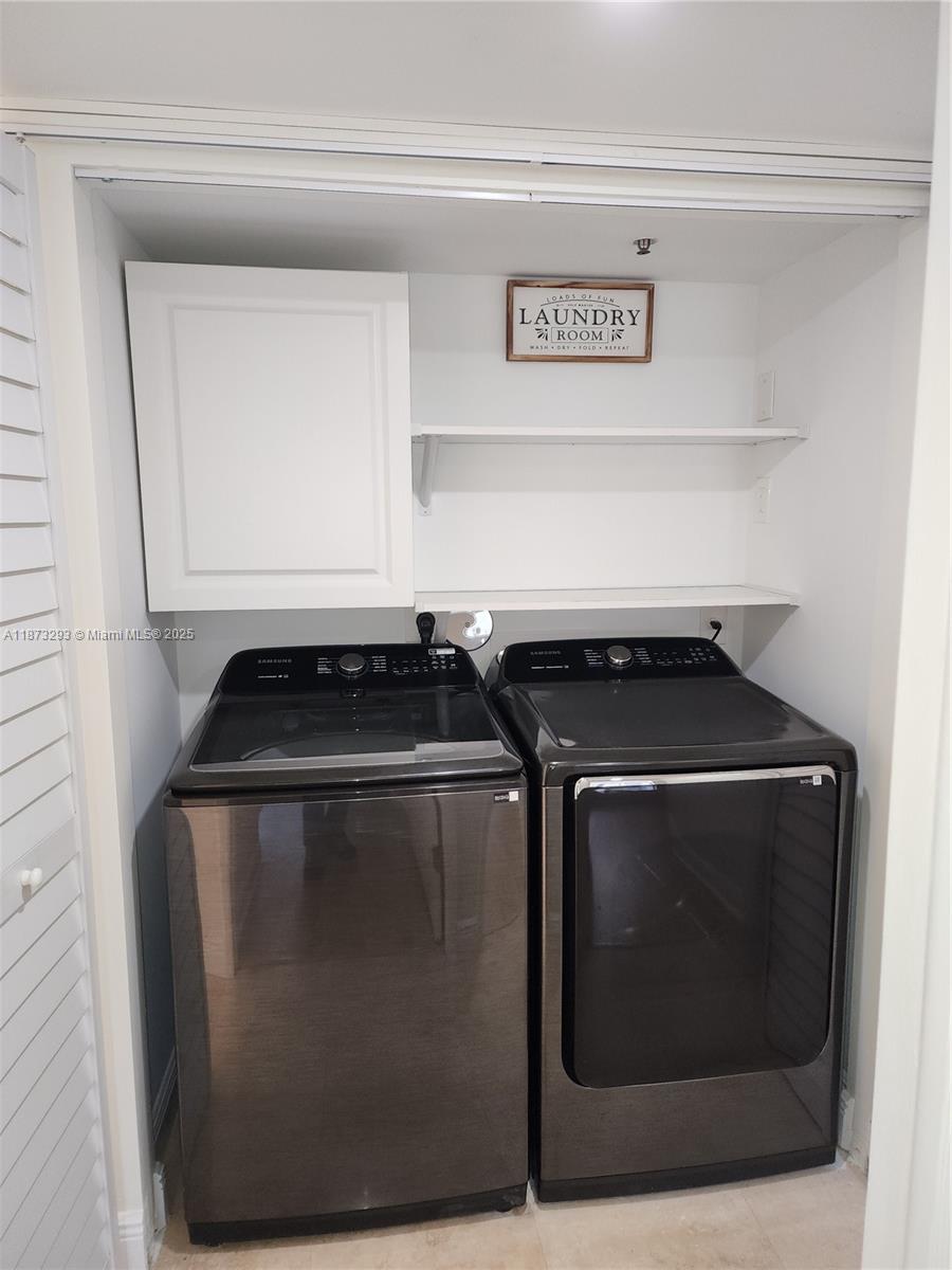 3259 Clint Moore Road, Unit 103 Boca Raton, FL 33496 - Photo 9 of 40 a close view of a stove top oven