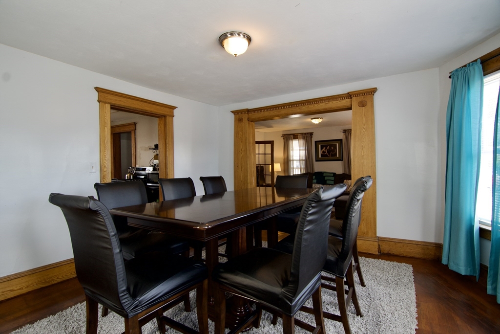 16 Amity Court Springfield, MA 01108 - Photo 14 of 42 a dining room with furniture and wooden floor