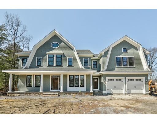 144 Schoolmasters Lane Dedham, MA 02026 - Photo 1 of 29 a front view of a house with a yard