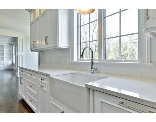 144 Schoolmasters Lane Dedham, MA 02026 - Photo 16 of 29 a kitchen with a sink cabinets and window