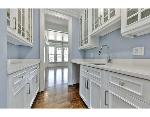 144 Schoolmasters Lane Dedham, MA 02026 - Photo 17 of 29 a kitchen with stainless steel appliances granite countertop a stove and a sink