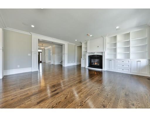 144 Schoolmasters Lane Dedham, MA 02026 - Photo 18 of 29 a view of a livingroom with furniture fire place and wooden floor