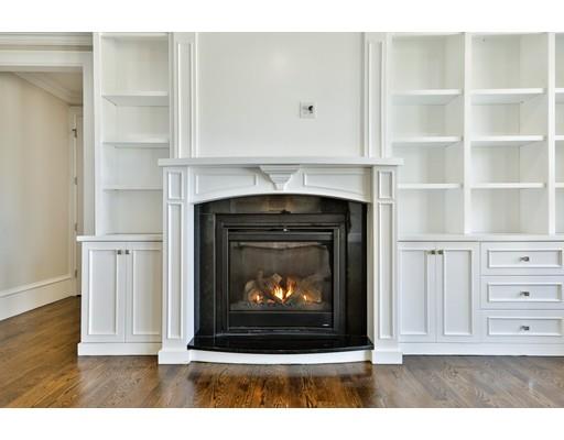 144 Schoolmasters Lane Dedham, MA 02026 - Photo 21 of 29 a white building with a fireplace